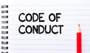 Image of spiral binder with text that says Code of Conduct